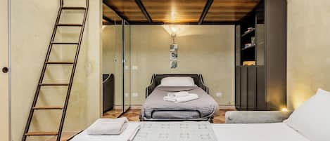 1 dormitori, habitacions insonoritzades i planxa i posts de planxar