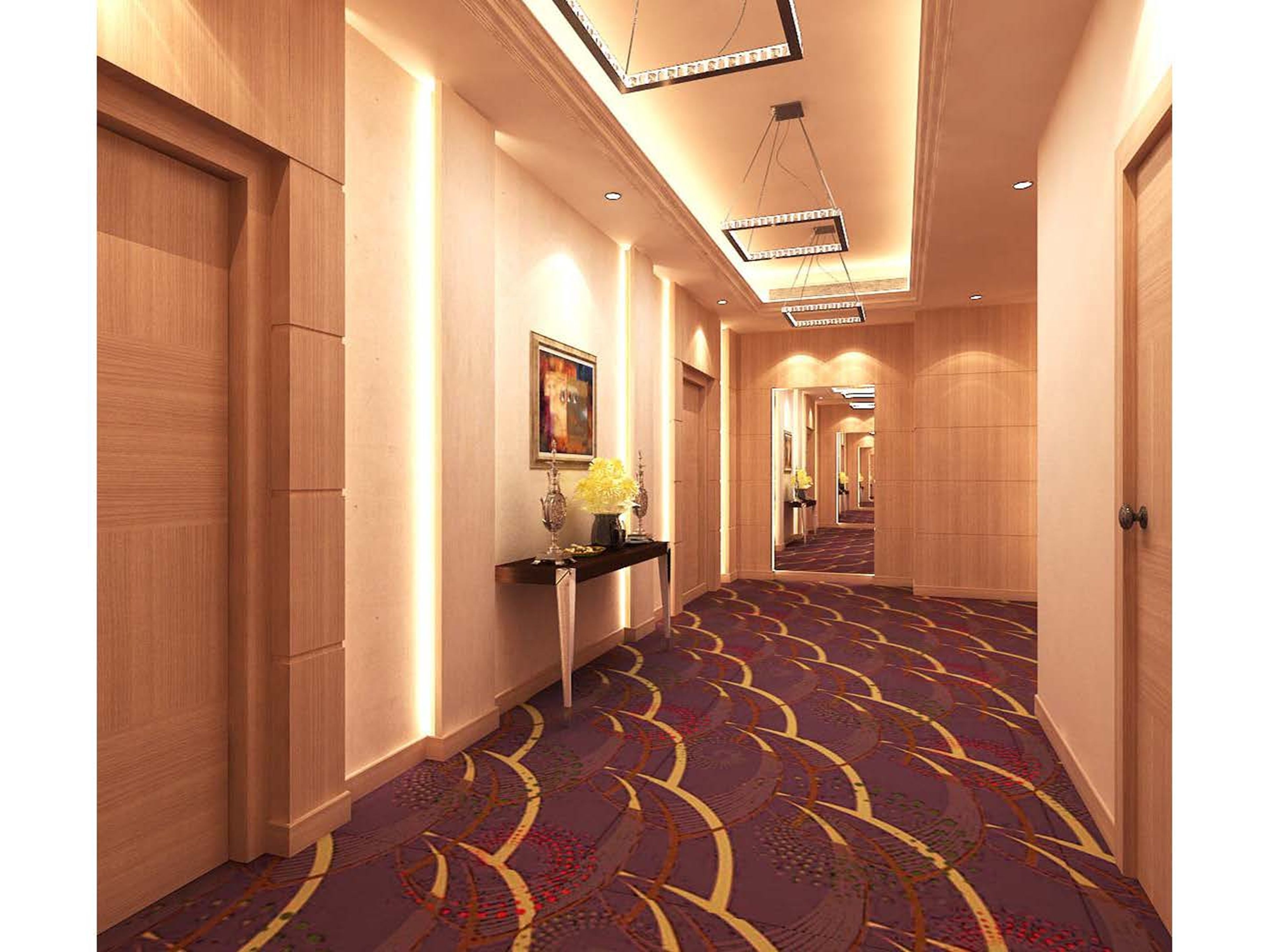 A hotel hallway with wooden paneling, a patterned carpet, and a mirror reflecting the corridor.