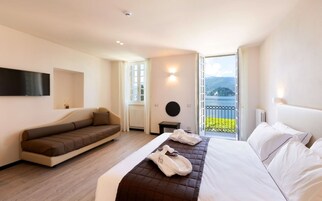 Suíte júnior | Roupas de cama premium, frigobar, cofres nos quartos, escrivaninha