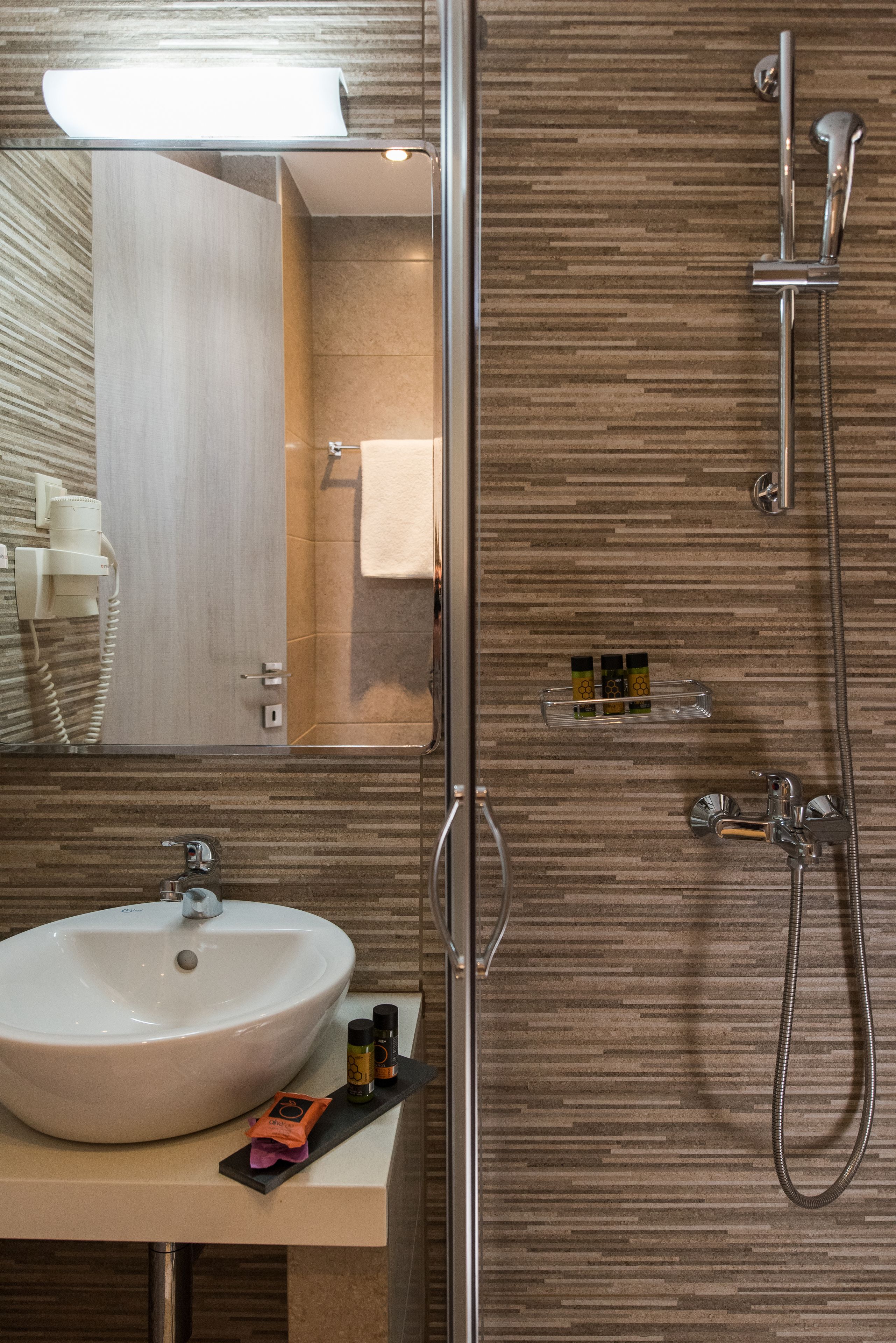 economy double room, 1 queen bed, city view | bathroom | shower, free toiletries, hair dryer, slippers