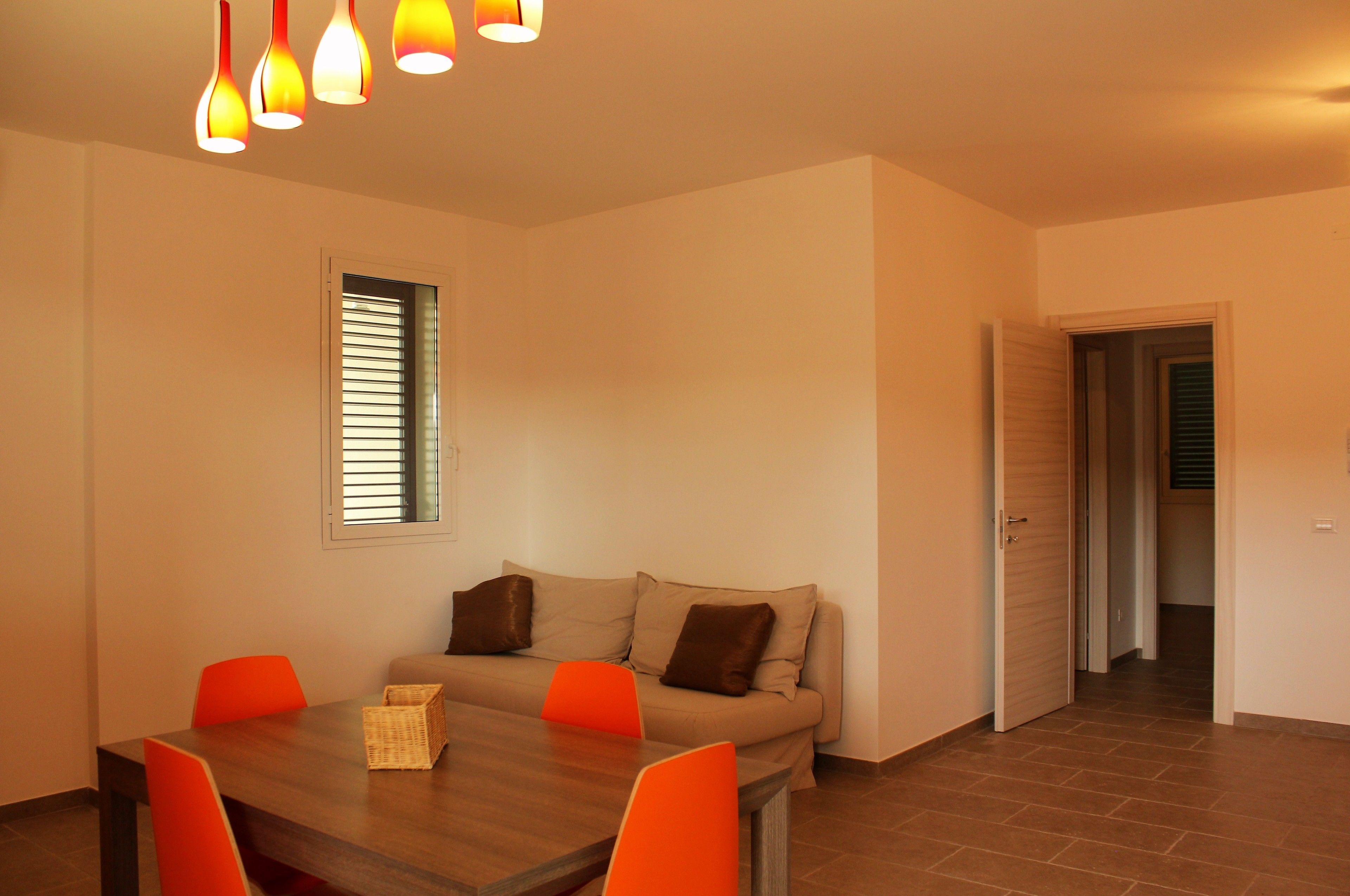 Departamento Deluxe, 2 habitaciones | Sala de estar | Televisión de pantalla plana 