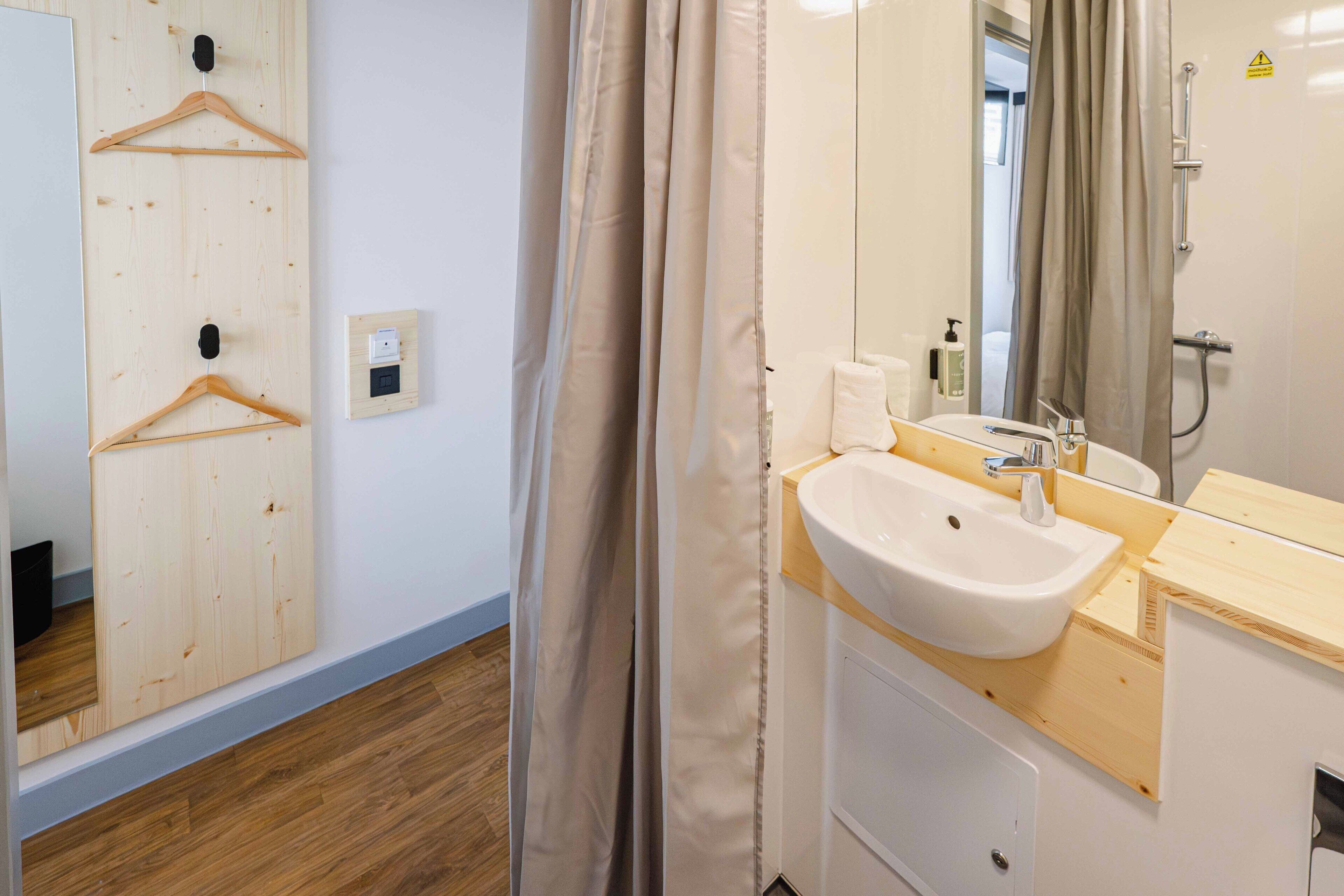 Shower, free toiletries, towels, soap