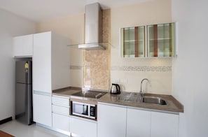 Premium Villa, 2 Bedrooms, Non Smoking, Pool View | Private kitchen | Fridge, microwave, stovetop, dishwasher - Sanga Villas (Rawai)