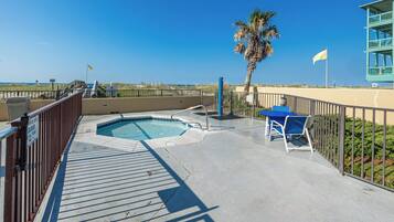 Take the kids to the kiddie pool with a beachfront view