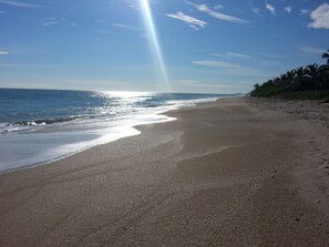 On the beach, sun-loungers, beach towels