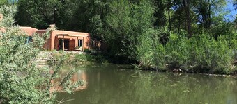 Unique Chimayo Village Adobe Casita on a wildlife pond between Santa Fe and Taos