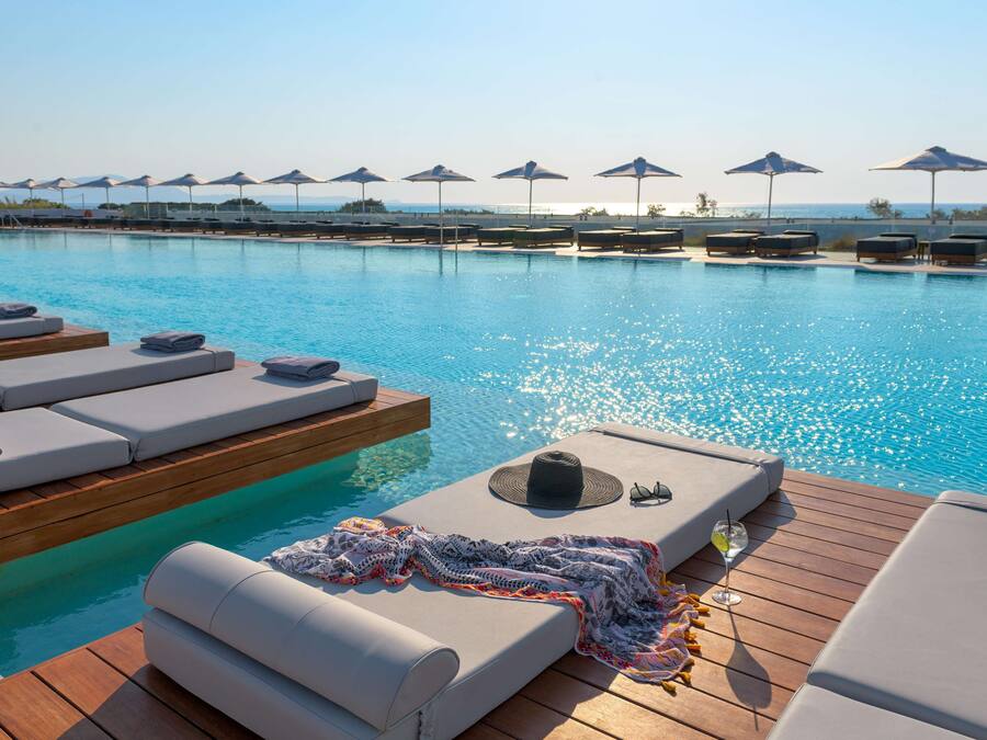 Indoor pool, 4 outdoor pools, open 10 AM to 6 PM, pool umbrellas