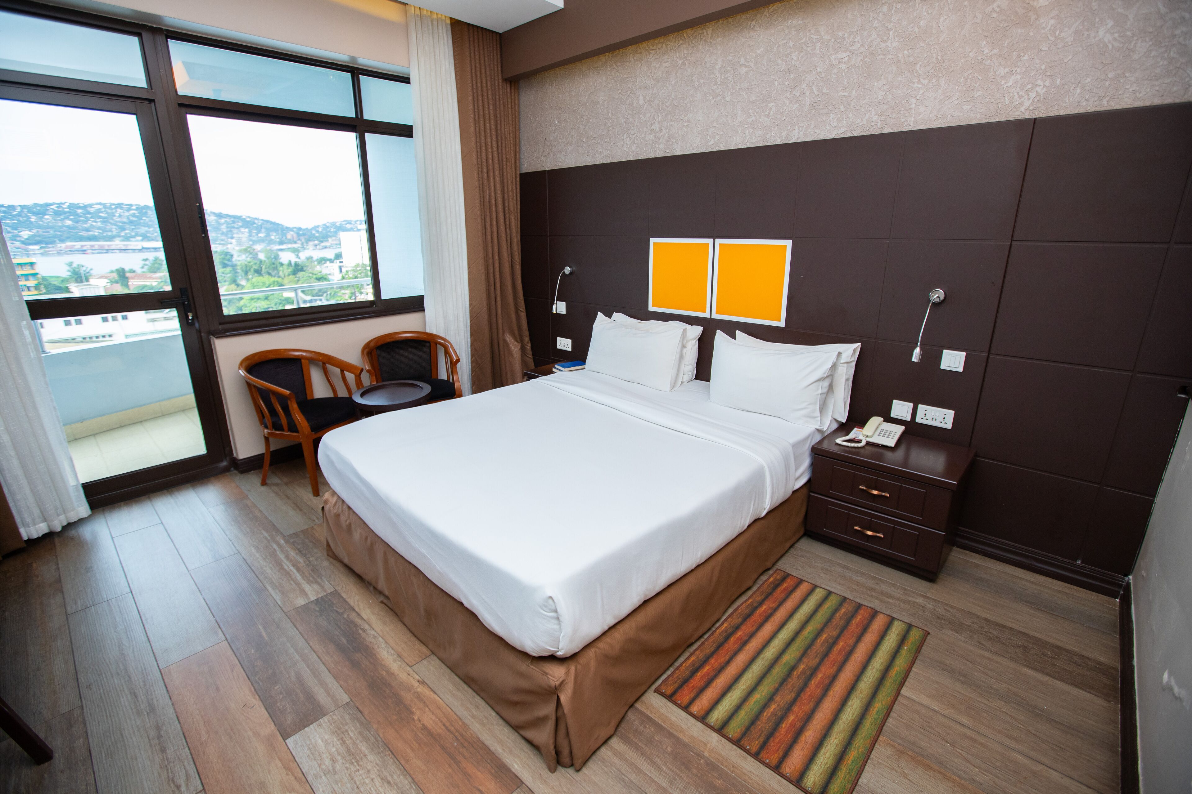 single room, 1 queen bed, lake view | 1 bedroom, in-room safe, desk, soundproofing