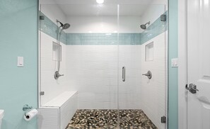 Shower, hair dryer, towels, shampoo