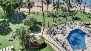 A resort with a pool, beach, and palm trees. - Oceanfront Condo at the Mana Kai Maui, Luxurious, Designer Remodeled (Kihei)