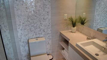 Shower, hair dryer, towels