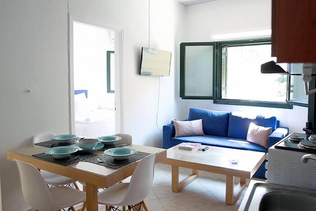 Apartment, 1 Bedroom, Balcony, City View | Living area | Flat-screen TV