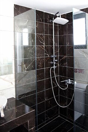 Apartment, 1 Bedroom | Bathroom | Shower, free toiletries, hair dryer, slippers