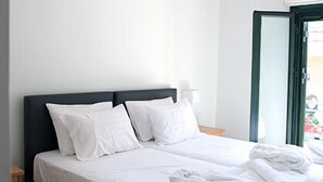 Deluxe Apartment, 1 Bedroom, Balcony, City View | Iron/ironing board, WiFi (free) - Geo Holidays Studios (Trifylia)