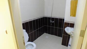 Shower, free toiletries, hair dryer, slippers