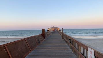 On the beach, sun loungers, beach towels
