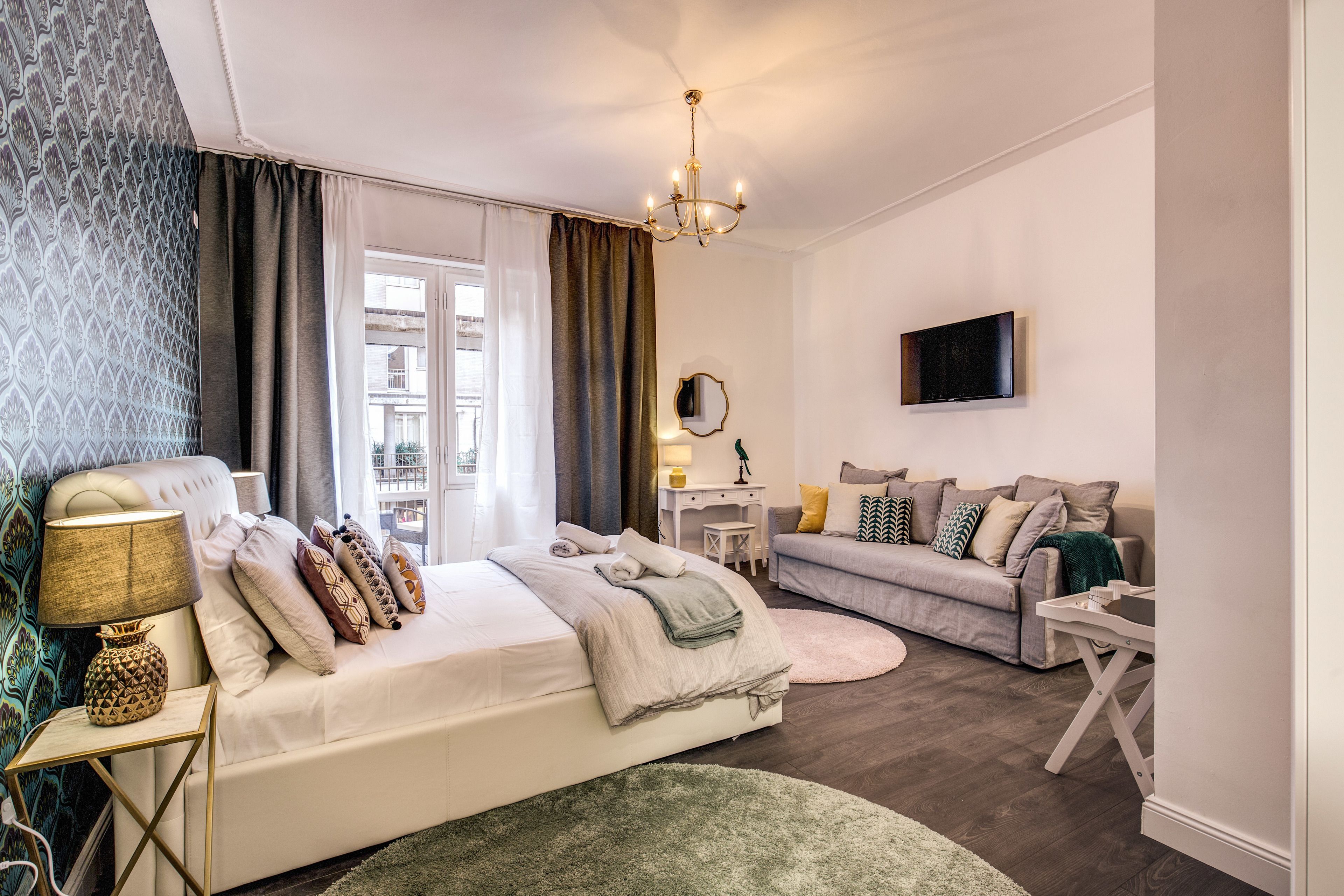 Habitación familiar, balcón | Cunas (de pago), wifi gratis, ropa de cama