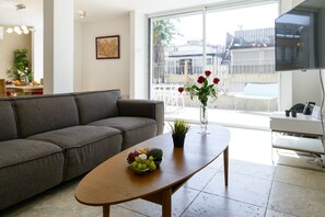 Executive Penthouse, 3 Bedrooms, Terrace | Living area | Smart TV