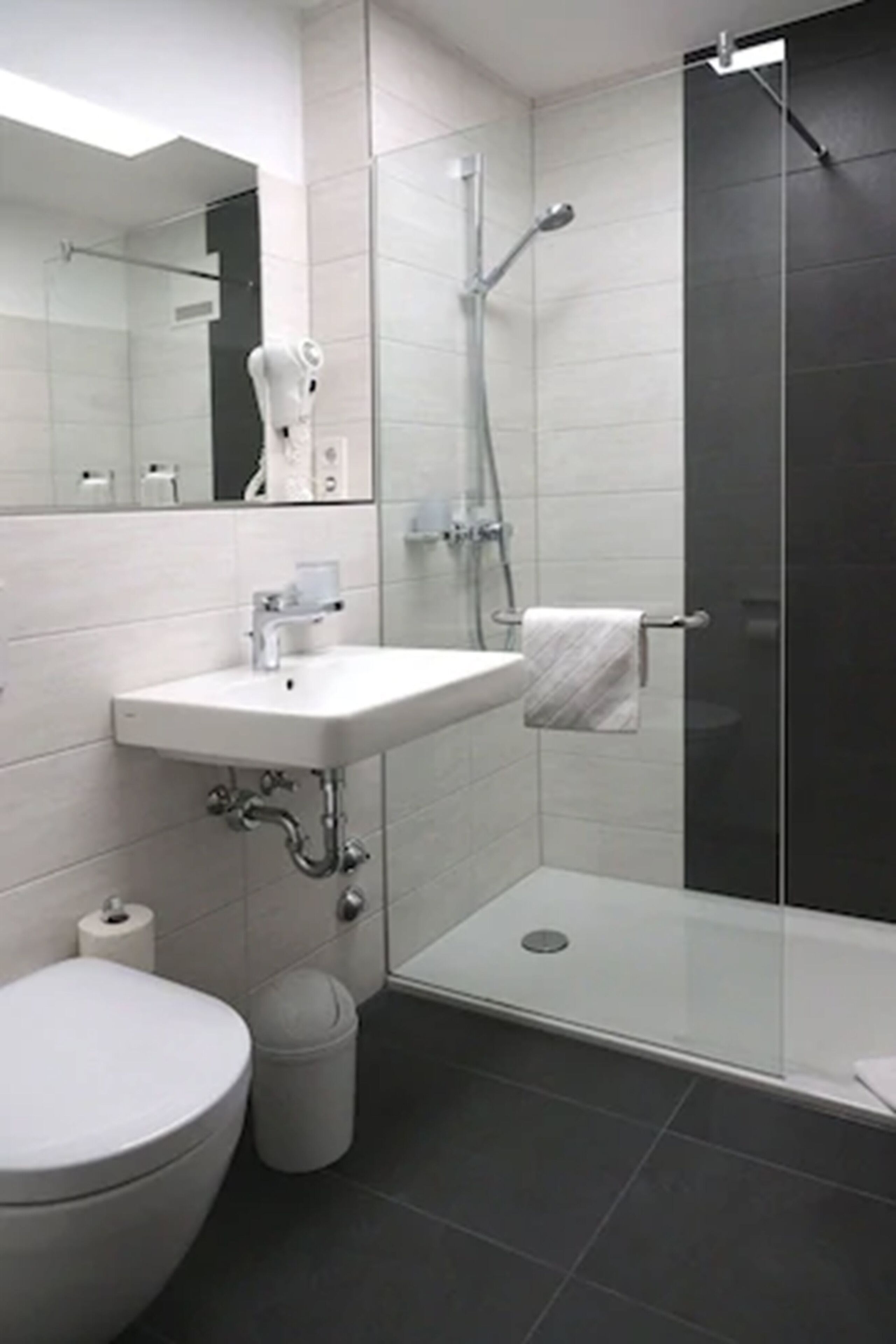 shower, free toiletries, hair dryer, slippers