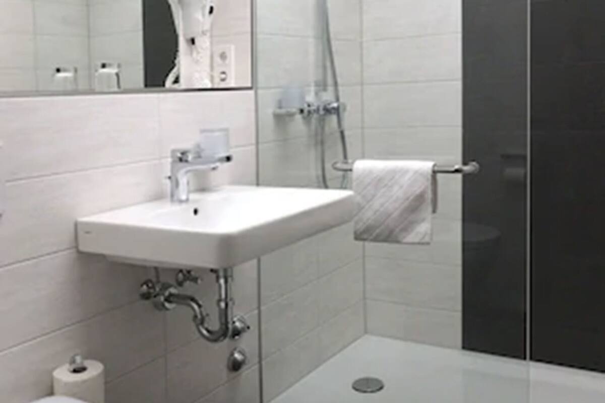 shower, free toiletries, hair dryer, slippers