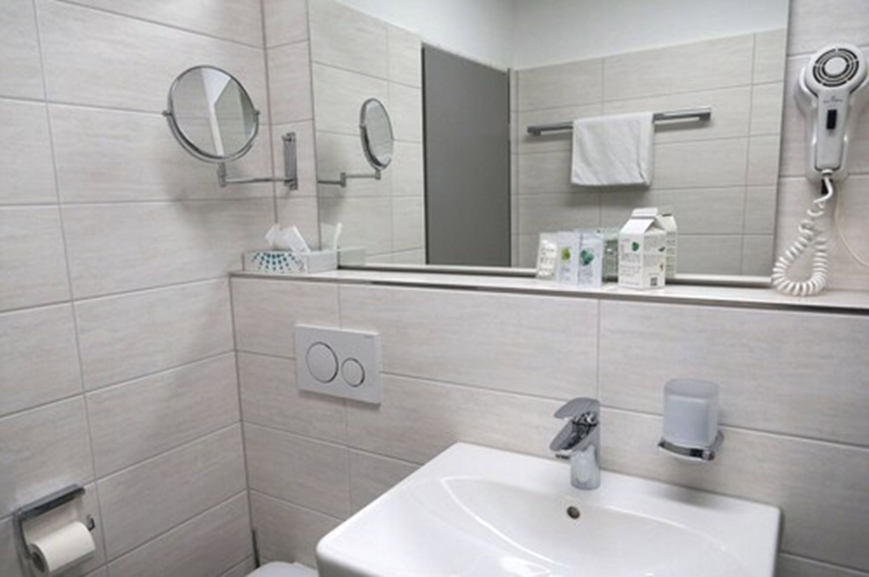 shower, free toiletries, hair dryer, slippers