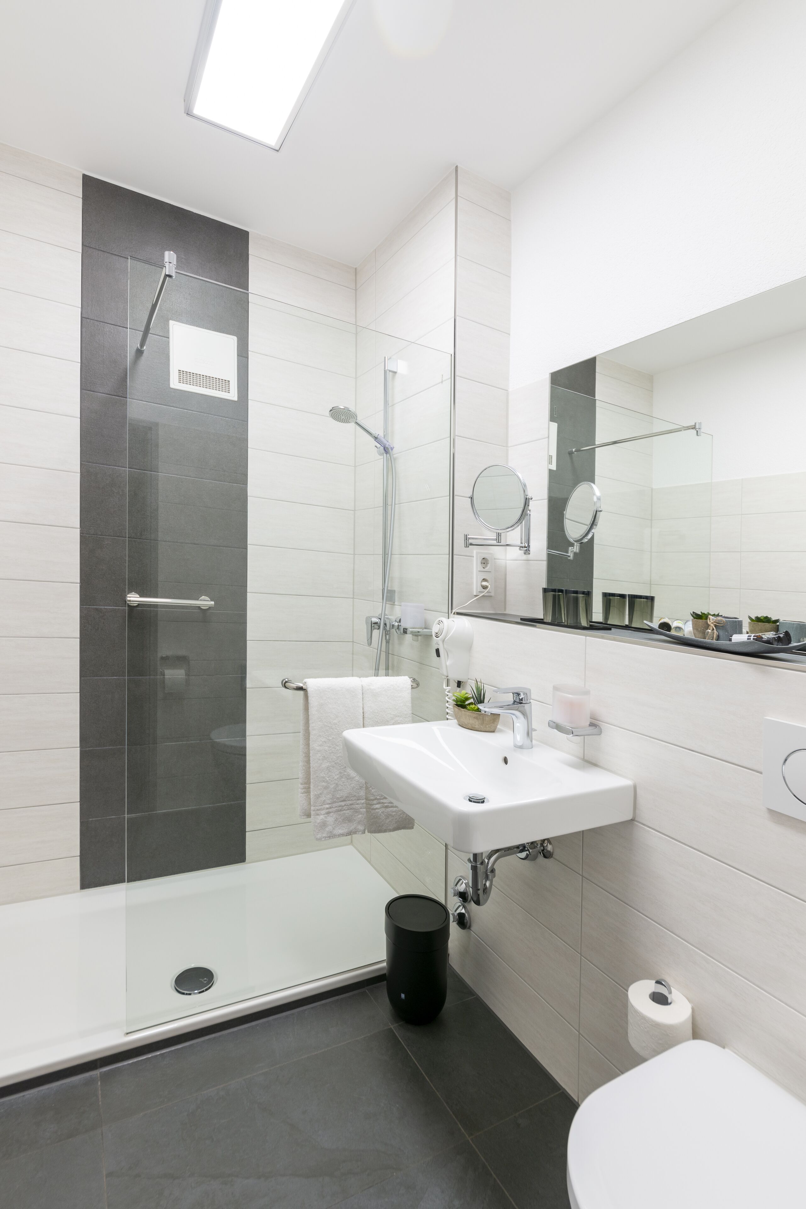 shower, free toiletries, hair dryer, slippers