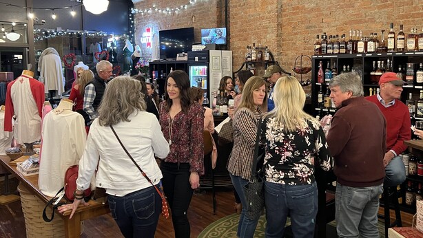 A brick-walled bar area with hanging lights and a television screen. - NEWPORT INN #1 - NO CLEANING FEES!! FREE PARKING!! WALK TO GAMES AND CONCERTS!! (Newport)