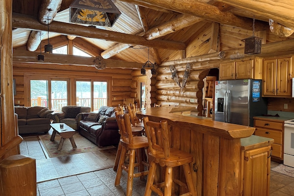 Open floor plan with beautifully work and unique vaulted ceiling design.