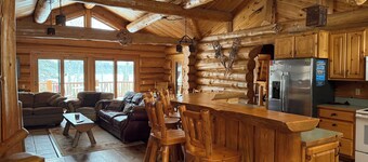 Handcrafted log lodge on Minnesota’s clearest lake. Nestled in the woods.