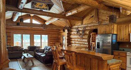 Handcrafted log lodge on Minnesota’s clearest lake. Nestled in the woods.