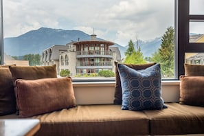 Living room bay window w/ views of the village stroll