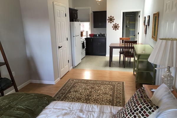 King size bed, full kitchen and a comfy chair (not pictured)