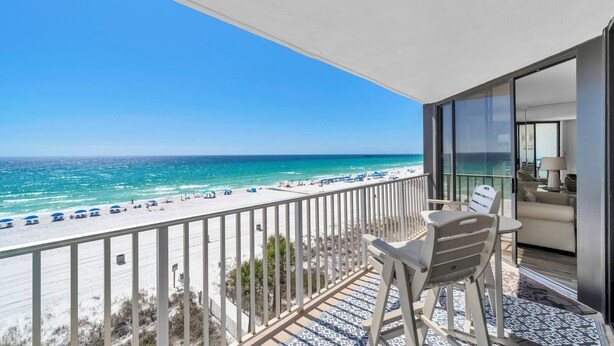 A balcony with a view of the beach and ocean. - Beachfront~Updated~Resort with Pools~Salty Kisses Windward at Edgewater403 (Panama City Beach)