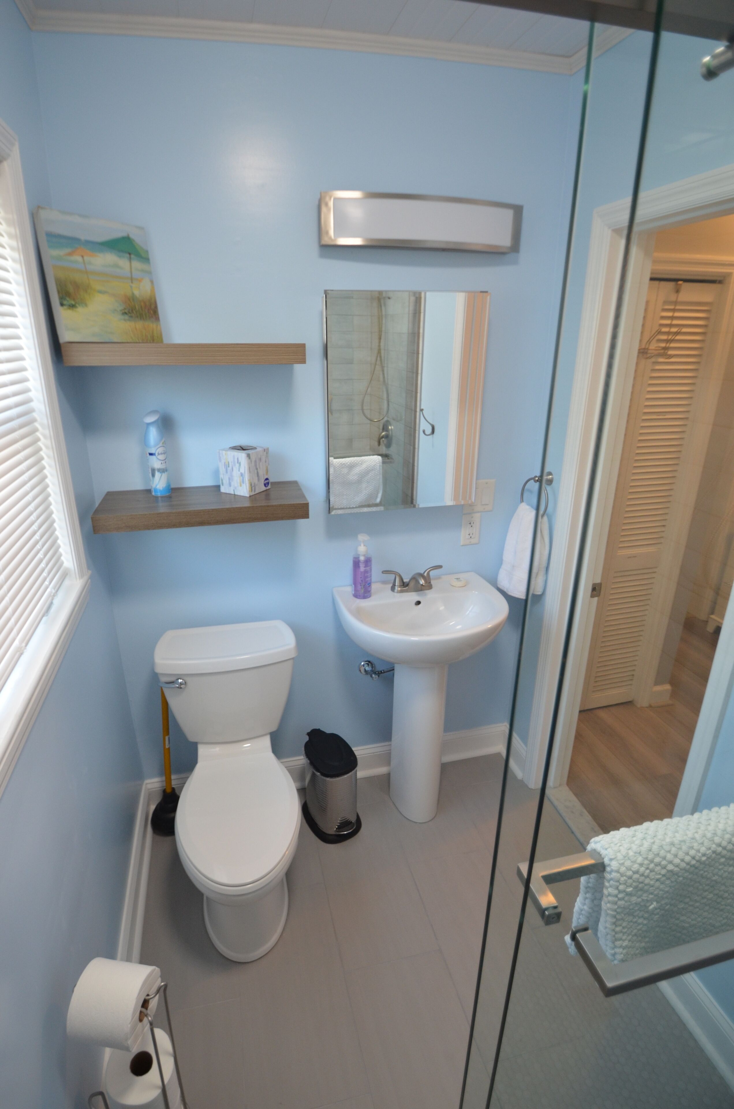 Combined shower/tub, hair dryer, towels, soap