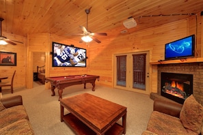 Smart TV, fireplace, DVD player, foosball