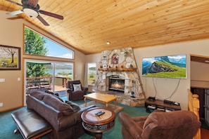 TV, fireplace, DVD player, foosball - Lakefront Manor by Destination Big Bear : Luxurious! Pool Table! Views! Multiple Decks! Master Suite! BBQ! (Big Bear Lake)