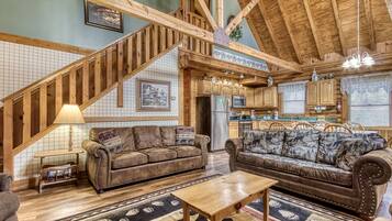 Televisión, chimenea, reproductor de DVD y futbolito