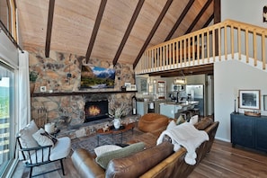 Flat-screen TV, fireplace, DVD player, foosball