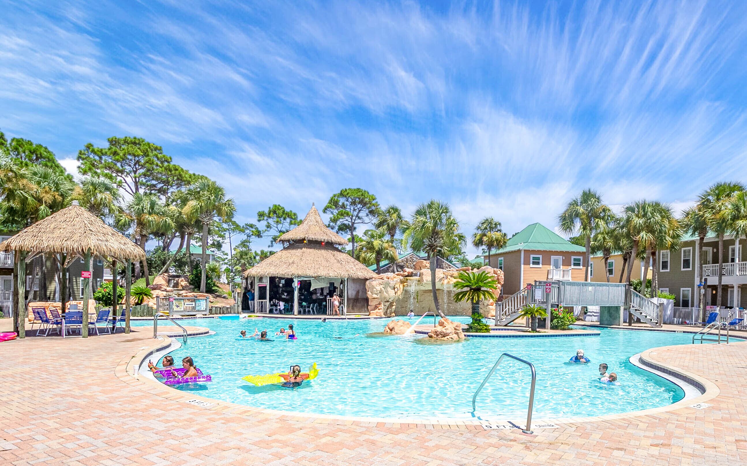 Coastal Retreat: Resort Condo Oasis with Serene Pool and Tiki Bar Delights