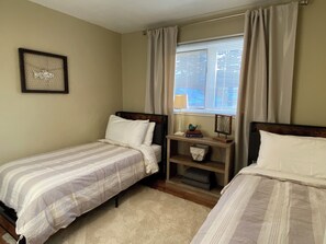 2 bedrooms, desk, blackout drapes, iron/ironing board