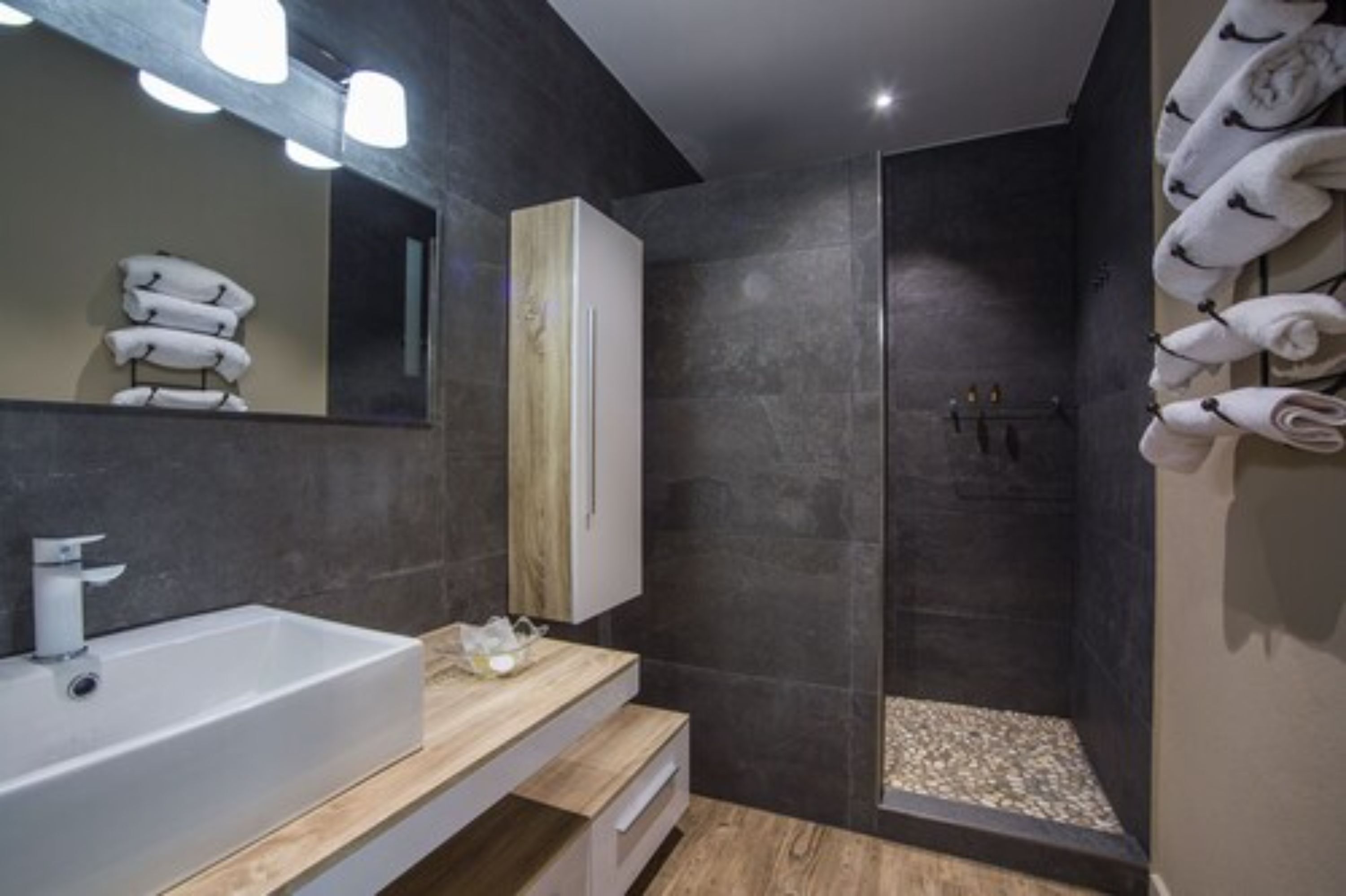quadruple room | bathroom | shower, rainfall showerhead, free toiletries, hair dryer