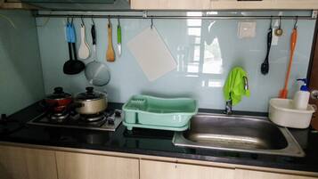 Fridge, stovetop, electric kettle, toaster