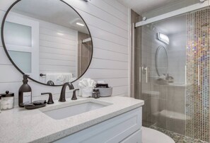 Shower, hair dryer, towels