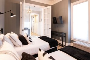 Iron/ironing board, travel crib, WiFi, bed sheets