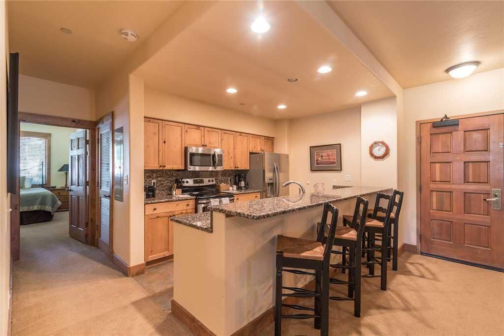 Condo, Multiple Beds (2107 Timberline Lodge, Trappeur's Cro) | Private kitchen | Fridge, microwave, oven, stovetop