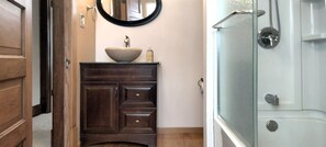 Combined shower/tub, hair dryer, towels, soap