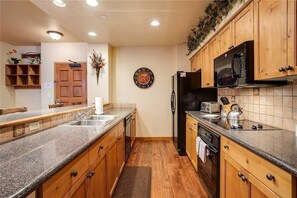 Condo, Multiple Beds (2208 Timberline Lodge, Trappeur's Cro) | Private kitchen | Fridge, microwave, oven, stovetop - 2208 Timberline Lodge, Trappeur's Crossing Apartment 4 (Steamboat Springs)