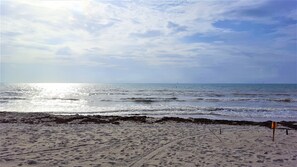 On the beach, sun loungers, beach towels