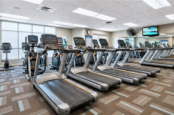 A gym with multiple treadmills, stationary bikes, and elliptical machines. - Honua Kai | Ocean View 2 BR Sleeps 6 | Car Incl. w/ 6+ Nights | HKK-334 by KBM (Lahaina)