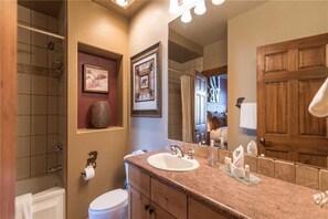A bathroom with a sink, mirror, and shower. - Tl2210 Perfect for A Couple! Winter Specials!! Many Outdoor Activities! (Steamboat Springs)